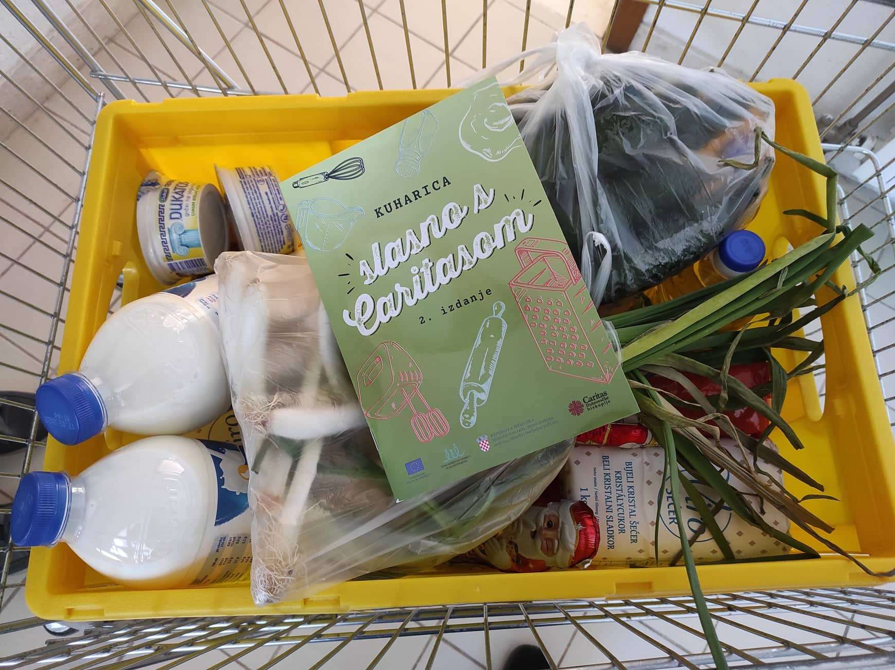 Uz projekt  ''Ruke dobrote'' izrađene Caritasove ekološke platnene vrećice i kuharica